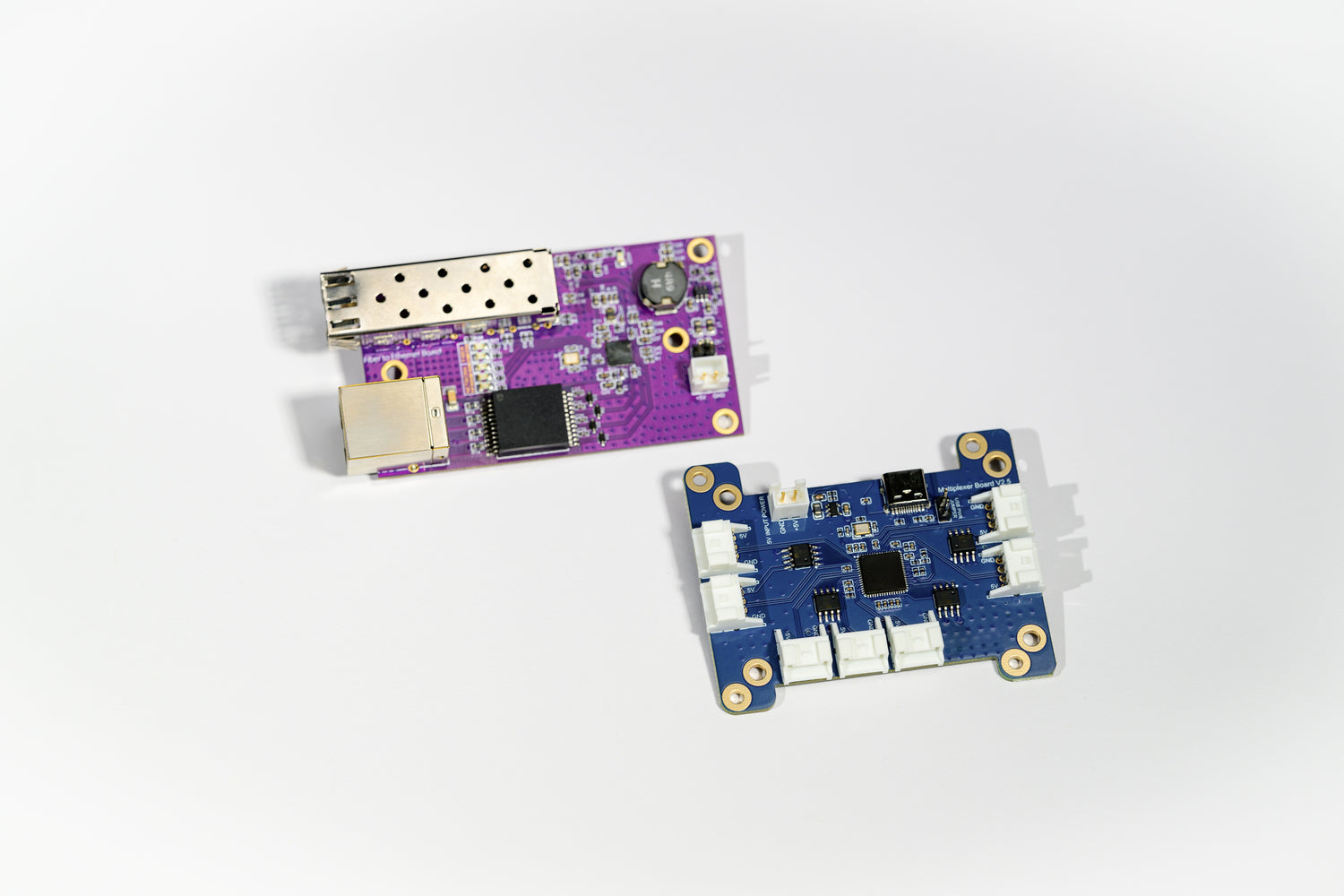 High-Performance Multiplexor Boards for Robotics and Automation – Image of Two Advanced Multiplexor Boards – Enhance Connectivity and Data Management in Your Systems with Premium Multiplexor Boards from Camerafy – Reliable and Efficient Solutions for Robotics, Automation, and Industrial Applications